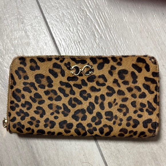 C. Wonder Brown and Black Wallet with Animal Print Design